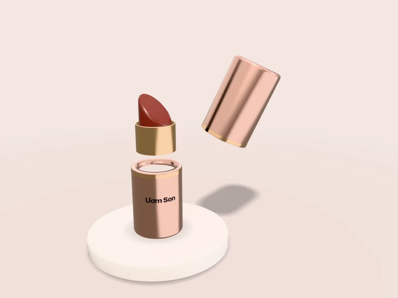 Thỏi son lõi 01 Đỏ Gạch nhô khỏi ống xoay vàng, thân vỏ nhôm hồng nude in chữ Ươm Son, nắp nhấc sang bên, trên bệ tròn trắng sữa
